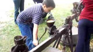 Shane grinding corn the old fashioned way....
