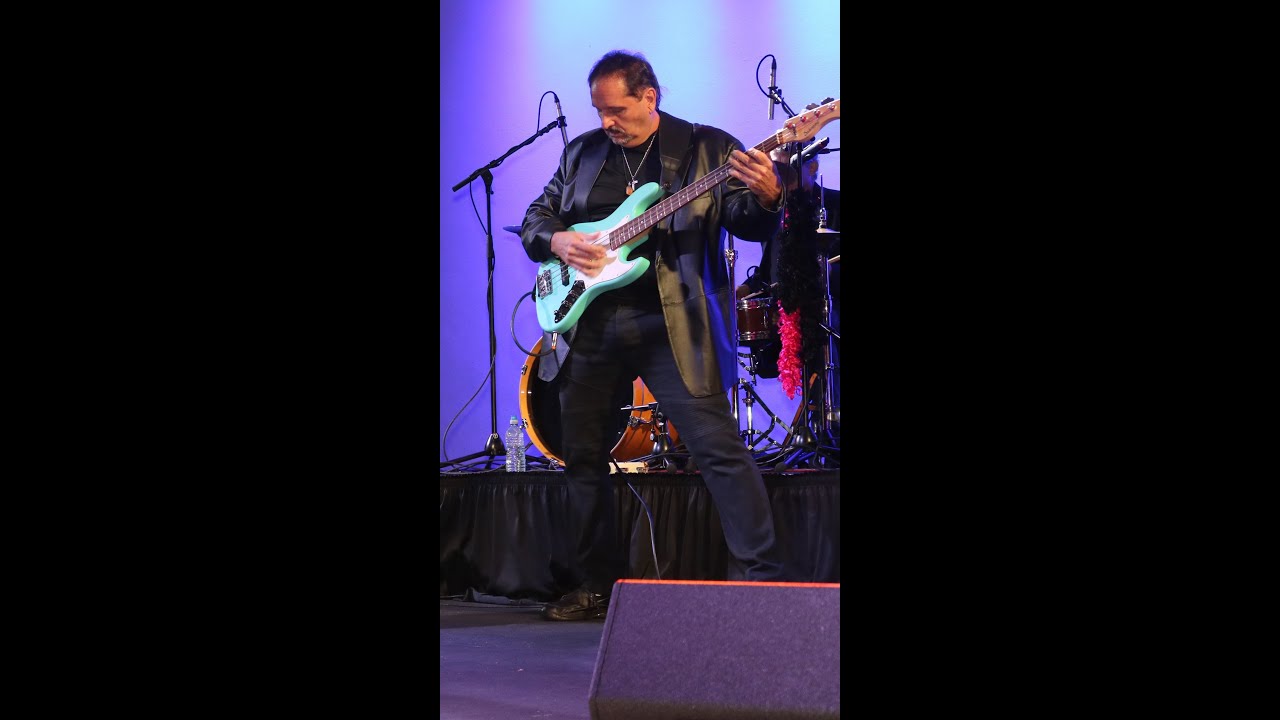 Paul Lee bass player with On The Roxx band (Bass solo)