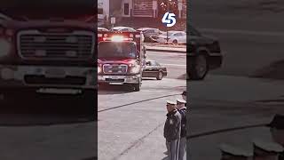 Police, fire officials escort Baltimore County Detective Paul Hoke to funeral home