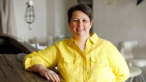 Tempest sous chef Susan Hendrix makes two scallop-...