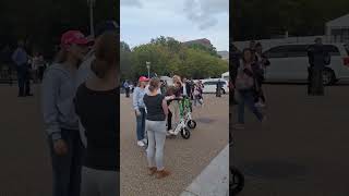 2 People Argue With A Protester In Frount Of The White House In Washington DC