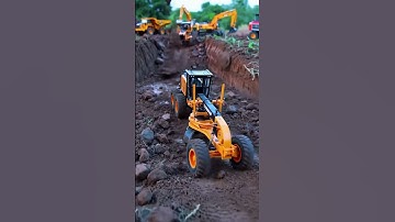 Miniature Construction Masterpiece: RC Motor Grader in Action! 🏗️