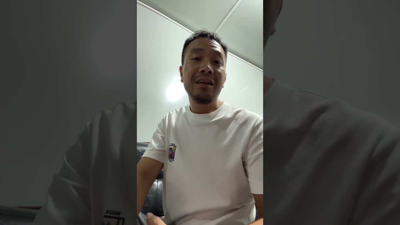 Who wears a wine bag around the neck of the coconut