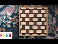 The Wims Mat Puzzle - A Pure Packing Puzzle