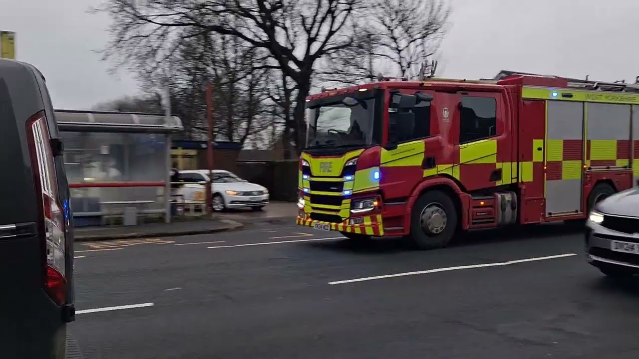 West Yorkshire fire appliance responding through Morley
