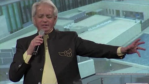 Benny Hinn sings "I Surrender All"