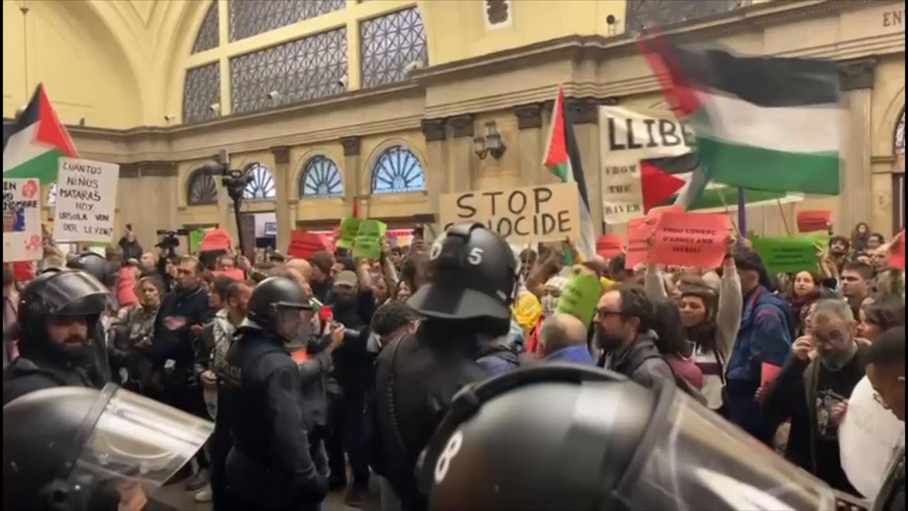 Pro-Palestinian protesters amass at Barcelona train station
