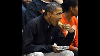 Obama eating hot dogs