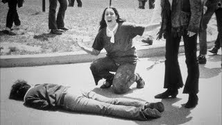 American Tragedy: The Shooting at Kent State (1977)
In 1970, four students were killed when National Guardsmen opened fire on protesters at Kent State University. By the next day, the photo of a 14-year-old runaway, weeping over a body, flashed around the world. Years later, Morley Safer found her and told her tragic story.
Join us on Patreon! https://www.patreon.com/ManufacturingIntellect
Donate Crypto! https://commerce.coinbase.com/checkout/868d67d2-1628-44a8-b8dc-8f9616d62259
Share this video!
The Kent State shootings (also known as the May 4 massacre or the Kent State massacre) were the shootings on May 4, 1970, of unarmed college students by members of the Ohio National Guard at Kent State University in Kent, Ohio, during a mass protest against the bombing of Cambodia by United States military forces. Twenty-eight guardsmen fired approximately 67 rounds over a period of 13 seconds, killing four students and wounding nine others, one of whom suffered permanent paralysis.
Some of the students who were shot had been protesting against the Cambodian Campaign, which President Richard Nixon announced during a television address on April 30 of that year. Other students who were shot had been walking nearby or observing the protest from a distance.
There was a significant national response to the shootings: hundreds of universities, colleges, and high schools closed throughout the United States due to a student strike of 4 million students, and the event further affected public opinion, at an already socially contentious time, over the role of the United States in the Vietnam War. American Tragedy: The Shooting at Kent State (1977)