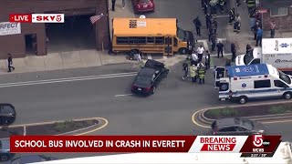 Multiple ambulances respond to crash involving school bus in Everett