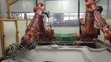 ABB 4400 pedestal type dual robot waterjet station