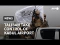 Taliban swoop into Kabul airport to celebrate defeating US | AFP