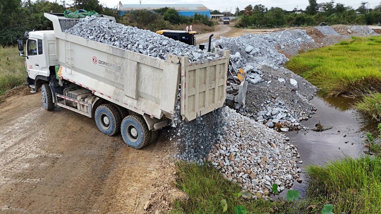 GREAT SITE, Talented Dump trucks with Skills Bulldozer fill stone huge flooded region