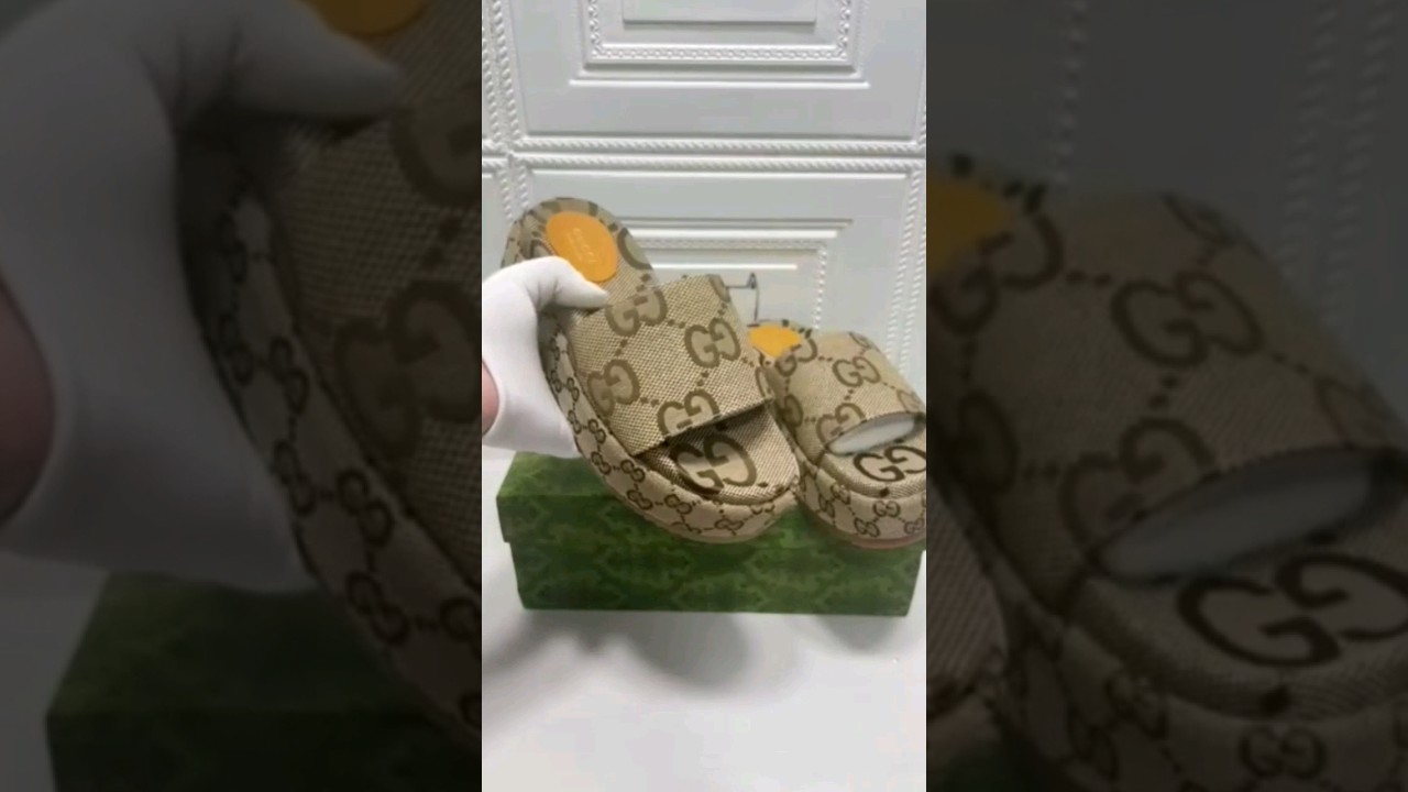 Gucci women's GG canvas Flatform sandals