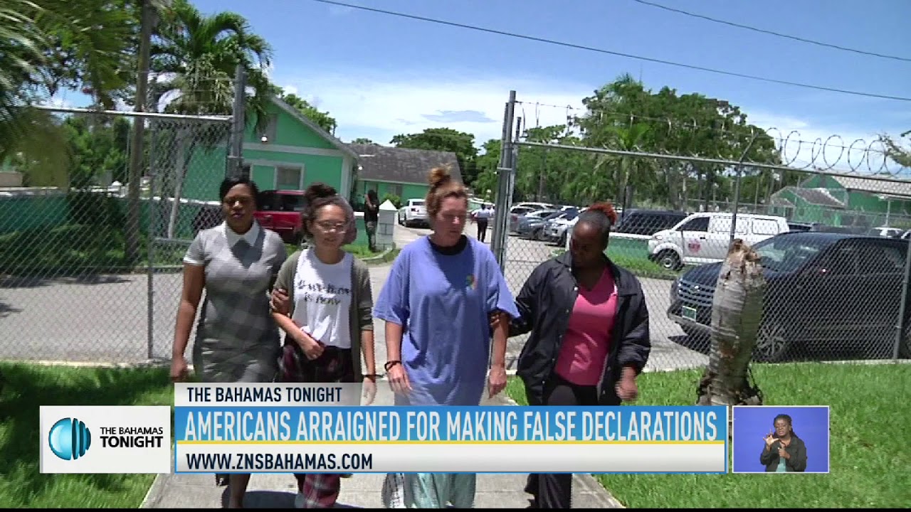 AMERICANS ARRAIGNED FOR FALSE DECLARATIONS