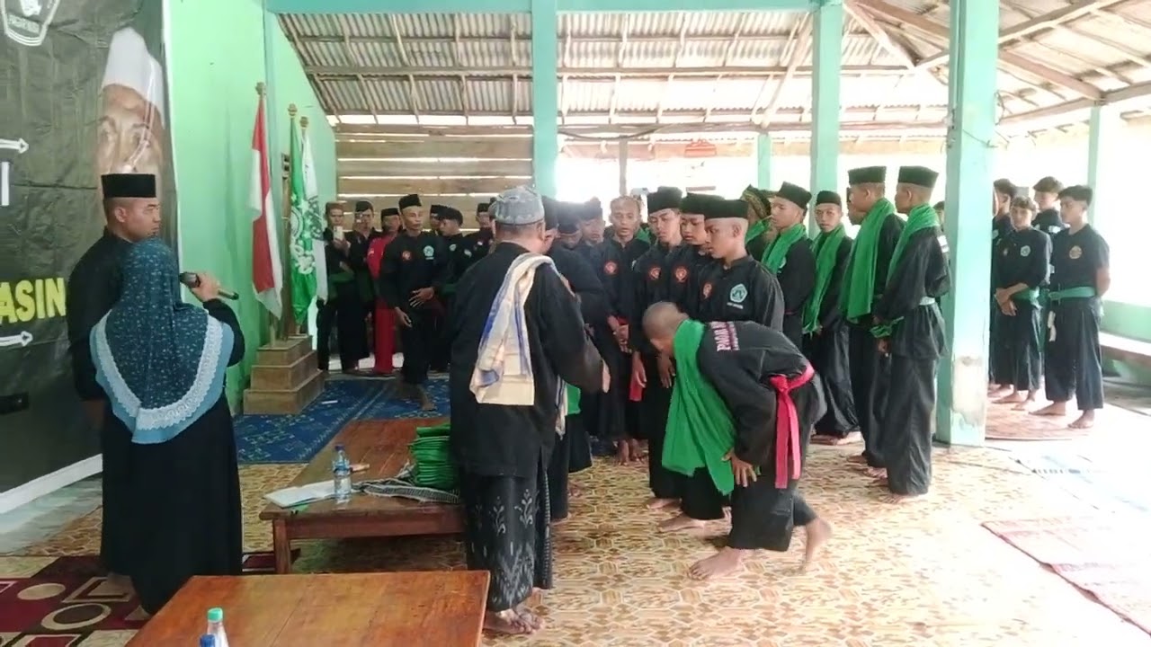 PENYERAHAN SABUK KEPADA ANGGOTA BARU PAGAR NUSA TUNGKAL ILIR