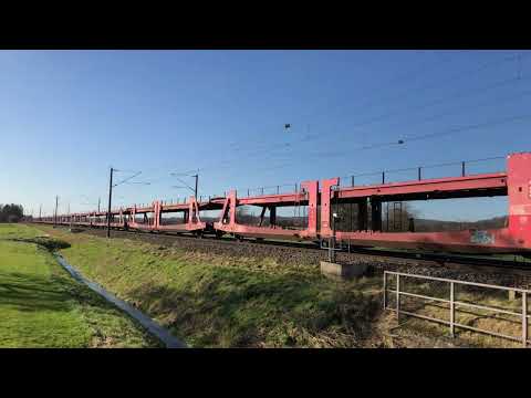 Güterzug mit 185 355-5 und leeren Autowagen