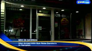 Man Shows Gun During Domino's Robbery