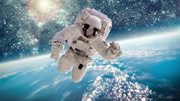free copyright background video astronaut in outer space against the backdrop of the planet earth