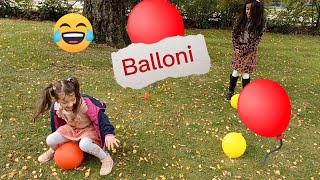 تحدي تحطيم البالونات المائيه/ وتحدي الأكل/ وصندوق الهدايا مع ساره ورحمة/ Balloni بوالين .