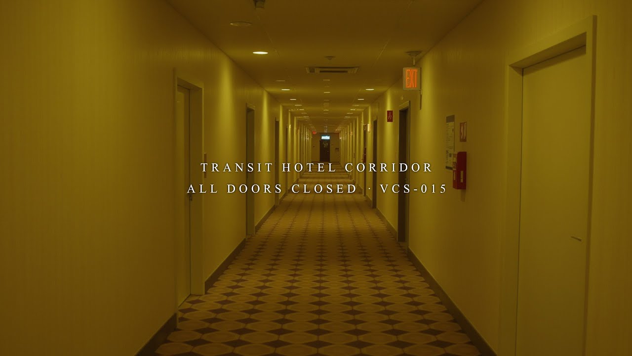 VCS-015 · Module 08: Transit Hotel Corridor – All Doors Closed