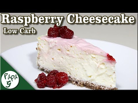 Low Carb Cheesecake With A Buttery Pecan Crust And A Sweet Raspberry Topping