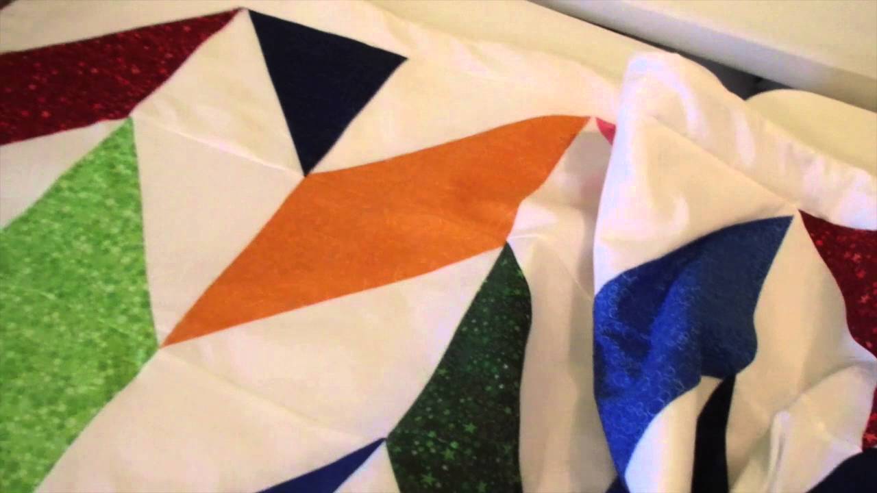 Getting the Herringbone quilt quilted.. YouTube
