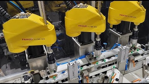 Vial Filler with Robotic Capper and Depucker