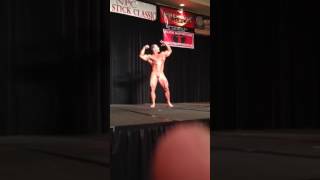 IFBB PRO Caleb Blanchard guest posing at the NPC Red Stick Classic