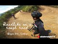 Roadbike on a rough road - Biga Pit, Cebu