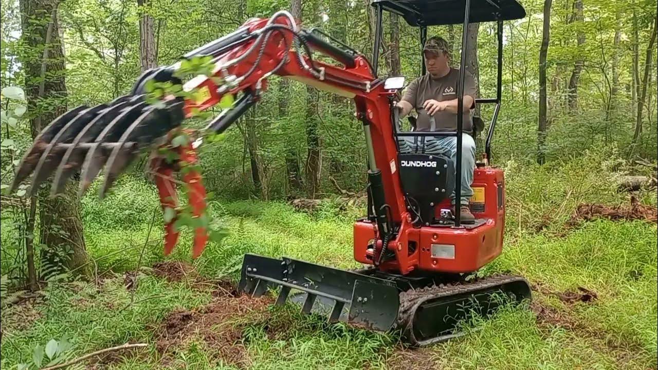 GroundHog BH14G-2 Mini Excavator Clearing Trails With a Rake. - YouTube