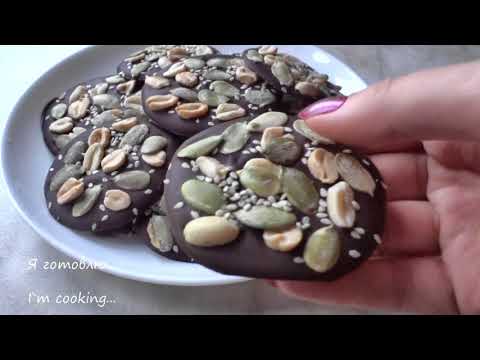Video: Chokladmedaljonger Med Kanderade Frukter Och Nötter