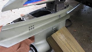 How to remove the lower unit on a outboard engine