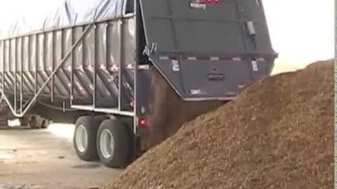 Trinity Trailer - Belt Trailer Unloading Load of Mulch