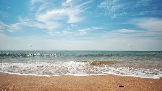 Gentle Waves Lapping Sandy Shoreline, Blue Sky With Scattered Clouds, Peaceful Crimean Coastal