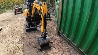 Buying a shipping container and digging footings with a Chinese mini excavator