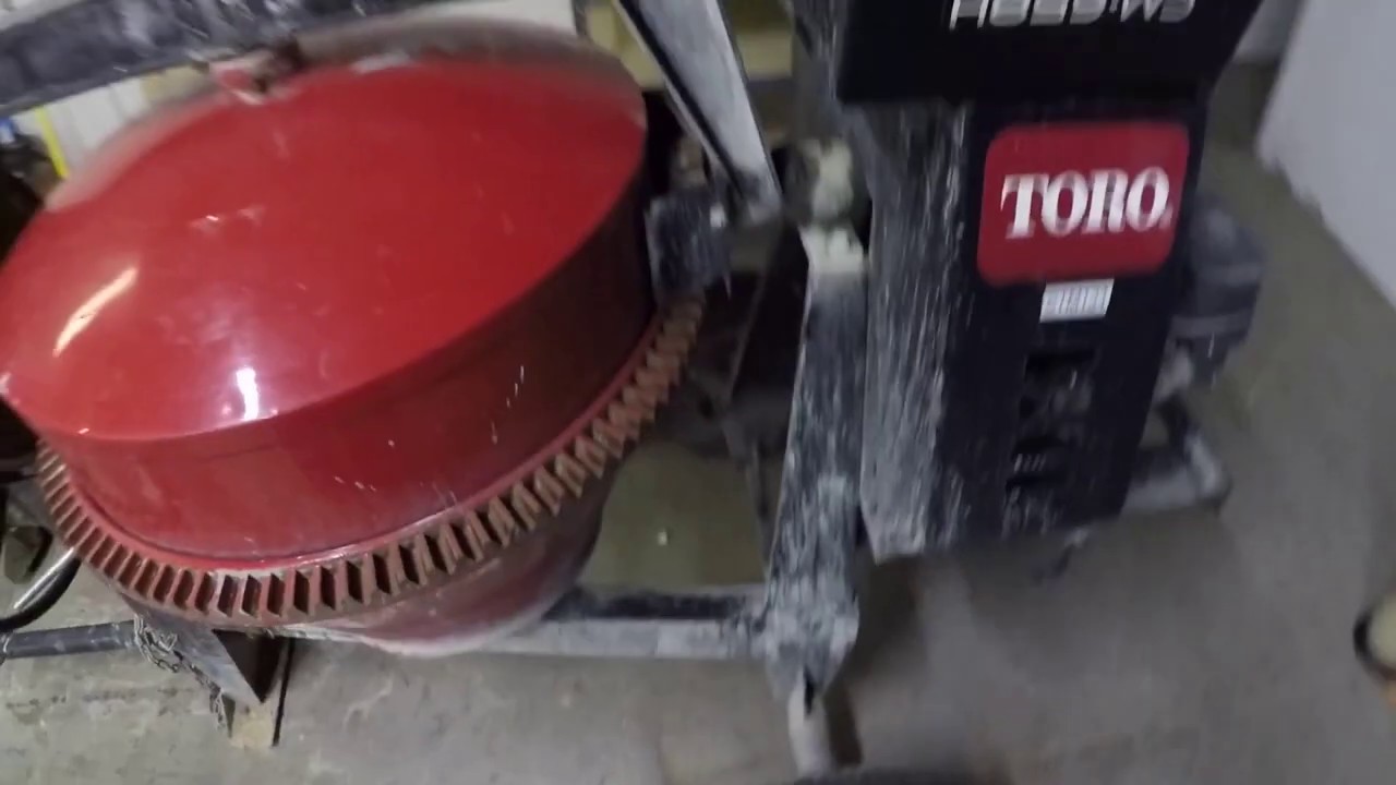 Cement mixer service. Toro CM 658H tow behind cement mixer. Routine