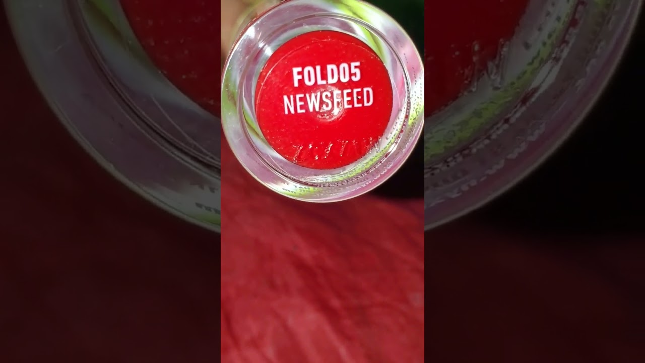 Swatch of NYX Fat lip drip Oil in Newspeed