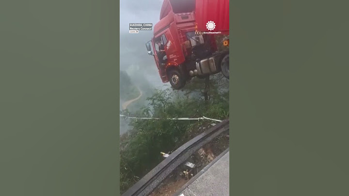 Man, Truck Dangle Over Cliff After Bridge Collapses in China