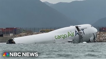 Two killed after cargo plane slides off runway at Hong Kong’s airport