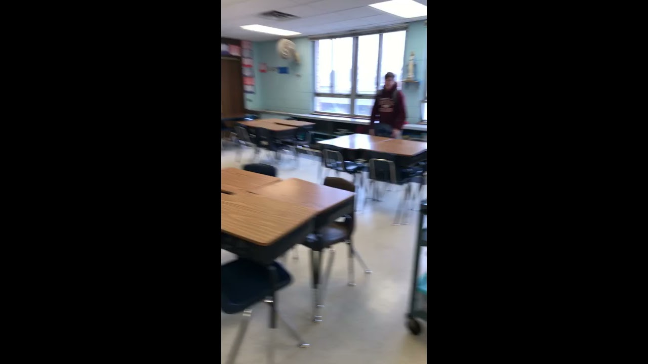 Kid Throws Chair Across Room In School