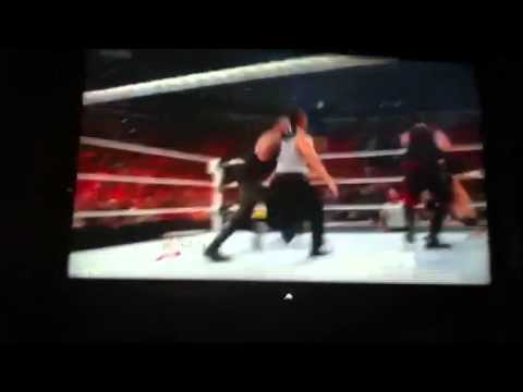 WWE 1000 EPISODE OF RAW UNDERTAKER COMES BACK FROM The Dead To Help His Brother Kane