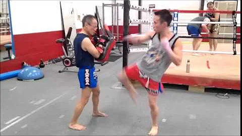Cam Tang Poy practicing kicks at York Muay Thai