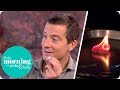 Bear Grylls shows you how to make fire with a packet of gum, a battery and some fluff