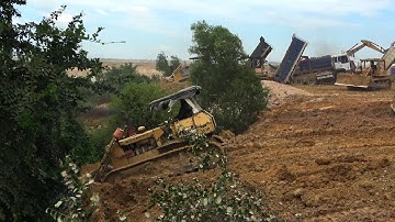 Amazing Bulldozer and Dump Truck in Action - Bulldozer Pushing Soil and Dump Truck Unloading Soil