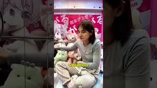 She stuck inside a claw machine