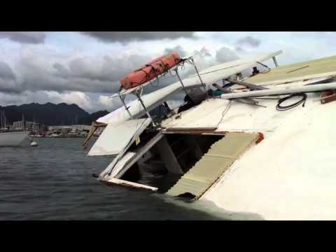 Half sunken catamaran goes down during the March t...