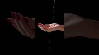 Pouring Water on a Person's Hand