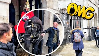 Man Pulls King's Horse Reins Continuously