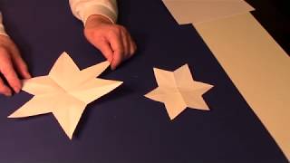 How to fold paper and cut a six point star